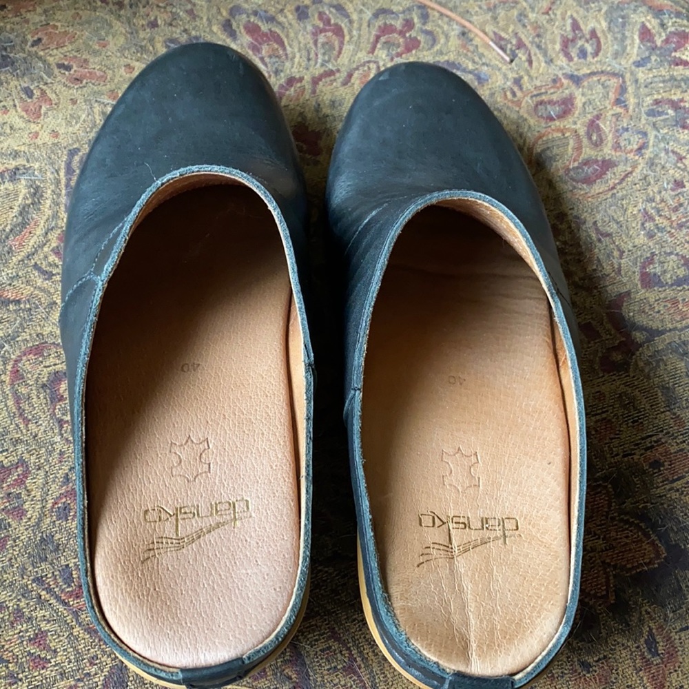 Dansko clogs. Wooden soles with heel.
